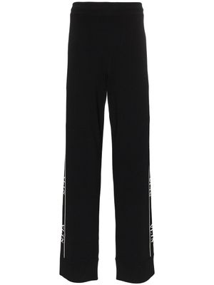 Valentino Garavani pantalon de jogging à bande logo - Noir