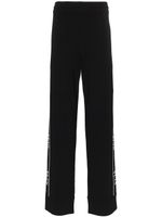 Valentino Garavani pantalon de jogging à bande logo - Noir