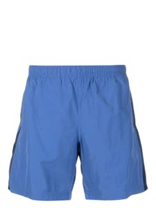 Alexander McQueen short de bain Selvedge à logo en jacquard - Bleu