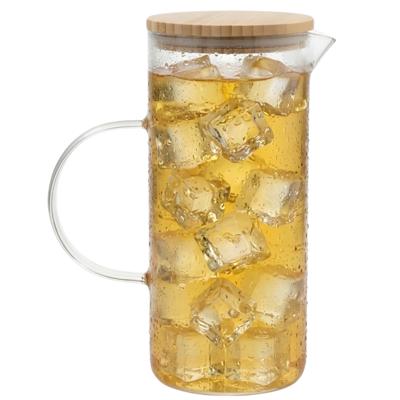 Gerimport Water / sapkan - met bamboe deksel - 1,5 ltr - boroscilaat glas - schenkkan