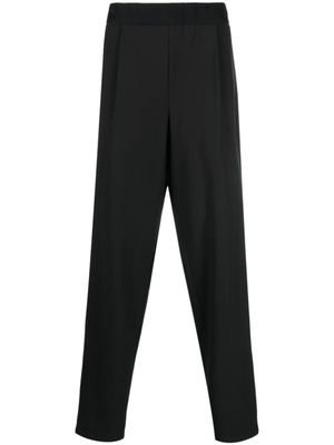 Giorgio Armani pantalon fuselé à détails plissés - Noir