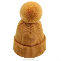 LGT JWLS Dames Beanie in Mosterdgeel - Met Pompon - thumbnail