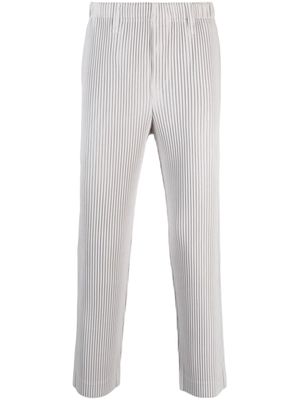 Homme Plissé Issey Miyake pantalon droit à effet plissé - Gris