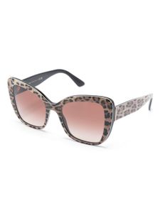 Dolce & Gabbana Eyewear lunettes de soleil à monture papillon oversize - Tons neutres
