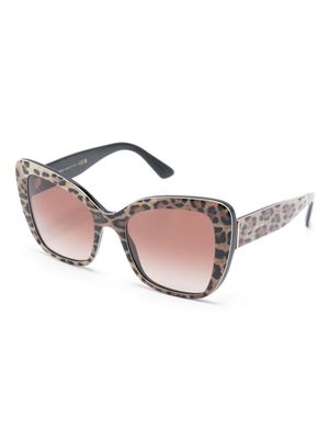Dolce & Gabbana Eyewear lunettes de soleil à monture papillon oversize - Tons neutres