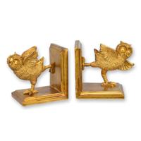 A PAIR OF RESIN OWL BOOKENDS A PAIR OF RESIN OWL BOOKENDS