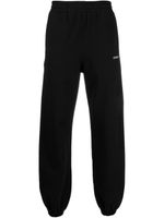 Off-White pantalon de jogging à rayures Diag - Noir