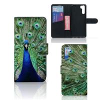 OPPO A91 | Reno3 | Telefoonhoesje | Met pasjeshouder | Pauw