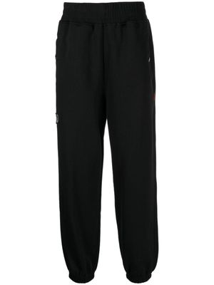 izzue pantalon de jogging à patch logo - Noir