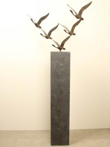 5 bronzen zwanen