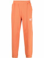 Helmut Lang pantalon de jogging fuselé à logo imprimé - Orange - thumbnail