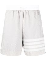 Thom Browne short de sport à détails 4 bandes signature - Gris - thumbnail