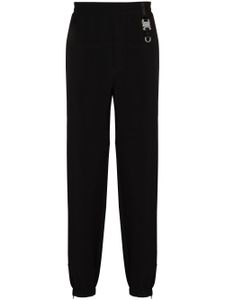 1017 ALYX 9SM pantalon de jogging fuselé à détail de boucle - Noir