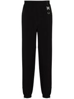 1017 ALYX 9SM pantalon de jogging fuselé à détail de boucle - Noir