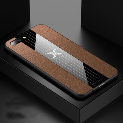 Voor OPPO R11 XINLI stiksels doek Textue schokbestendig TPU beschermhoes (bruin)