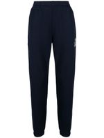 Lacoste pantalon de jogging en coton à logo imprimé - Bleu