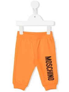 Moschino Kids pantalon de jogging à logo imprimé - Orange