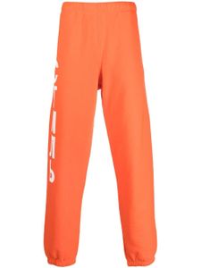 Heron Preston pantalon de jogging à logo imprimé - Orange