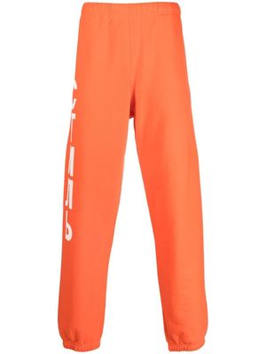 Heron Preston pantalon de jogging à logo imprimé - Orange