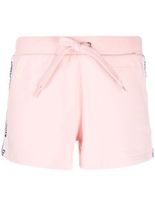 Moschino short à logo imprimé - Rose