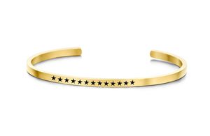 Key Moments 8KM-B00395 Stalen open bangle met tekst sterren zirkonia one-size goudkleurig