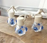 Auto Parfumflesje Boze Oog Diamantvorm - Spiritualiteit - Spiritueelboek.nl