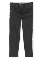 Stella McCartney Kids jean slim à bords rayés - Noir