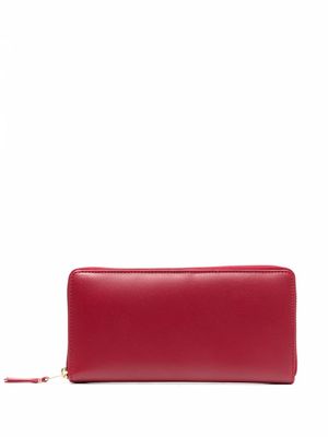 Comme Des Garçons Wallet portefeuille continental à fermeture zippée tout autour - Rouge
