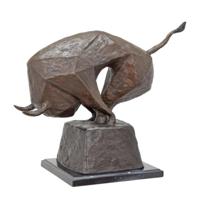 A MODERNIST BRONZE SCULPTURE OF A CHARGING BULL