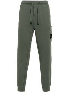 Stone Island pantalon de jogging à patch Compass - Vert