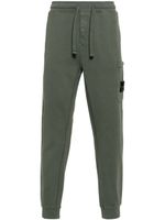 Stone Island pantalon de jogging à patch Compass - Vert