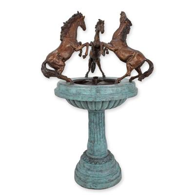 A BRONZE FOUNTAIN WITH 3 HORSES