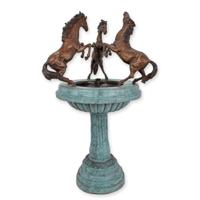 A BRONZE FOUNTAIN WITH 3 HORSES