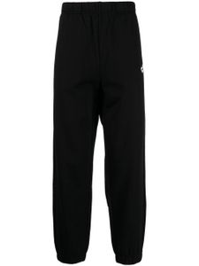 CHOCOOLATE pantalon de jogging en coton à logo imprimé - Noir