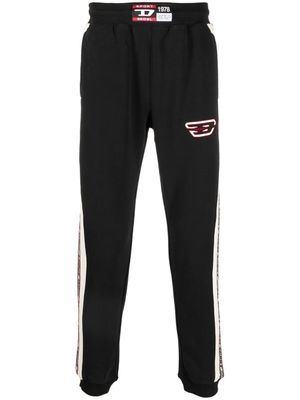 Diesel pantalon de jogging à patch logo - Noir