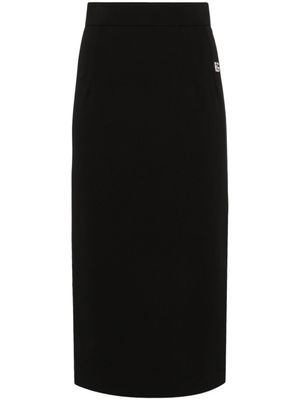Dolce & Gabbana jupe mi-longue à plaque logo - Noir