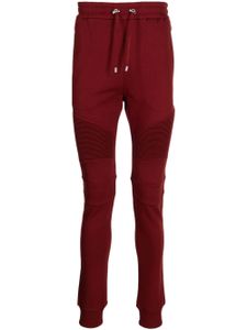 Balmain pantalon de jogging à logo imprimé - Rouge