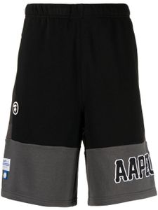 AAPE BY *A BATHING APE® short de sport à imprimé camouflage - Gris