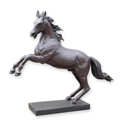 A BRONZE SCULPTURE OF A HORSE