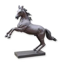 A BRONZE SCULPTURE OF A HORSE
