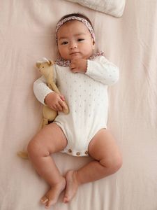 Babyromper met hoofdband ecru
