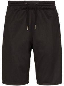 Givenchy pantalon de jogging Ticker à bande logo - Noir