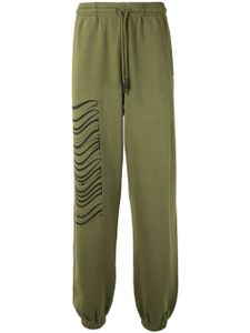 Marcelo Burlon County of Milan pantalon de jogging à logo imprimé - Vert