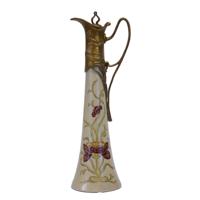A BRONZE MOUNTED PORCELAIN CLARET JUG A BRONZE MOUNTED PORCELAIN CLARET JUG
