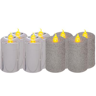 Feeric lights and christmas Kaarsen - 8x stuks - zilver - LED - H7,5 cm - glans en glitterafwerking
