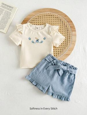 Bon&Bon Baby Girl Cute Floral & Rabbit Cartoon Print Round Neck Short Cap Sleeve Pullover Top And Elastic Waist Bow Decor Casual Shorts 2 Pieces Set, Blue / 18-24M