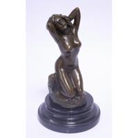 A BRONZE SCULPTURE OF A KNEELING NUDE - thumbnail