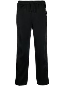 Saint Laurent pantalon de jogging rayé à logo brodé - Noir