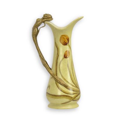 A BRONZE MOUNTED PORCELAIN WINE EWER