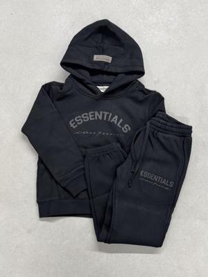 Cou7ure Essentials Basic Curve Trainingspak Kids Zwart - Maat 128 - Kleur: Zwart | Soccerfanshop